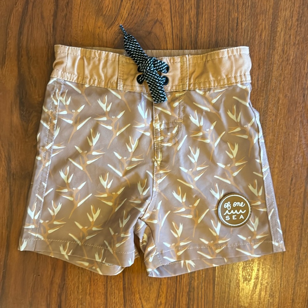 Of One Sea tan Bird of paradise board shorts